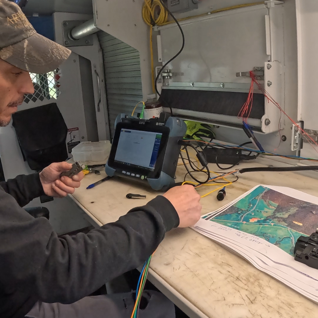 OTDR testing in progress during fiber installation QA