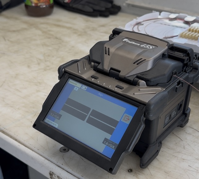 Fiber splicing and OTDR testing ensuring strong, secure network performance for cybersecurity protection