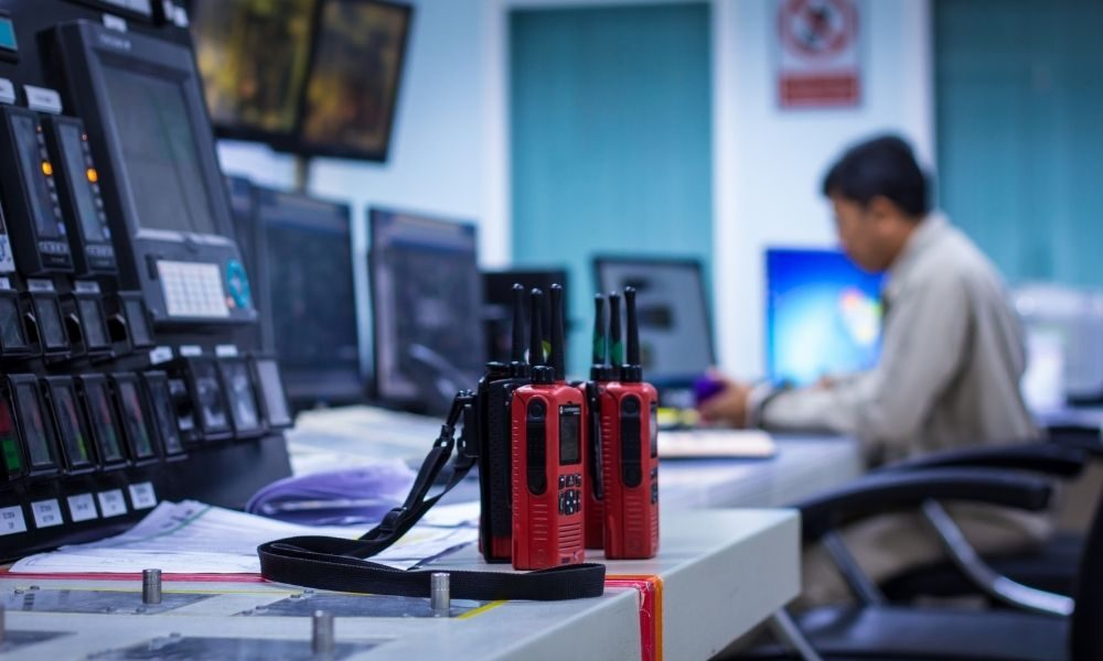 Emergency dispatch and public safety teams using secure fiber-based communication systems.